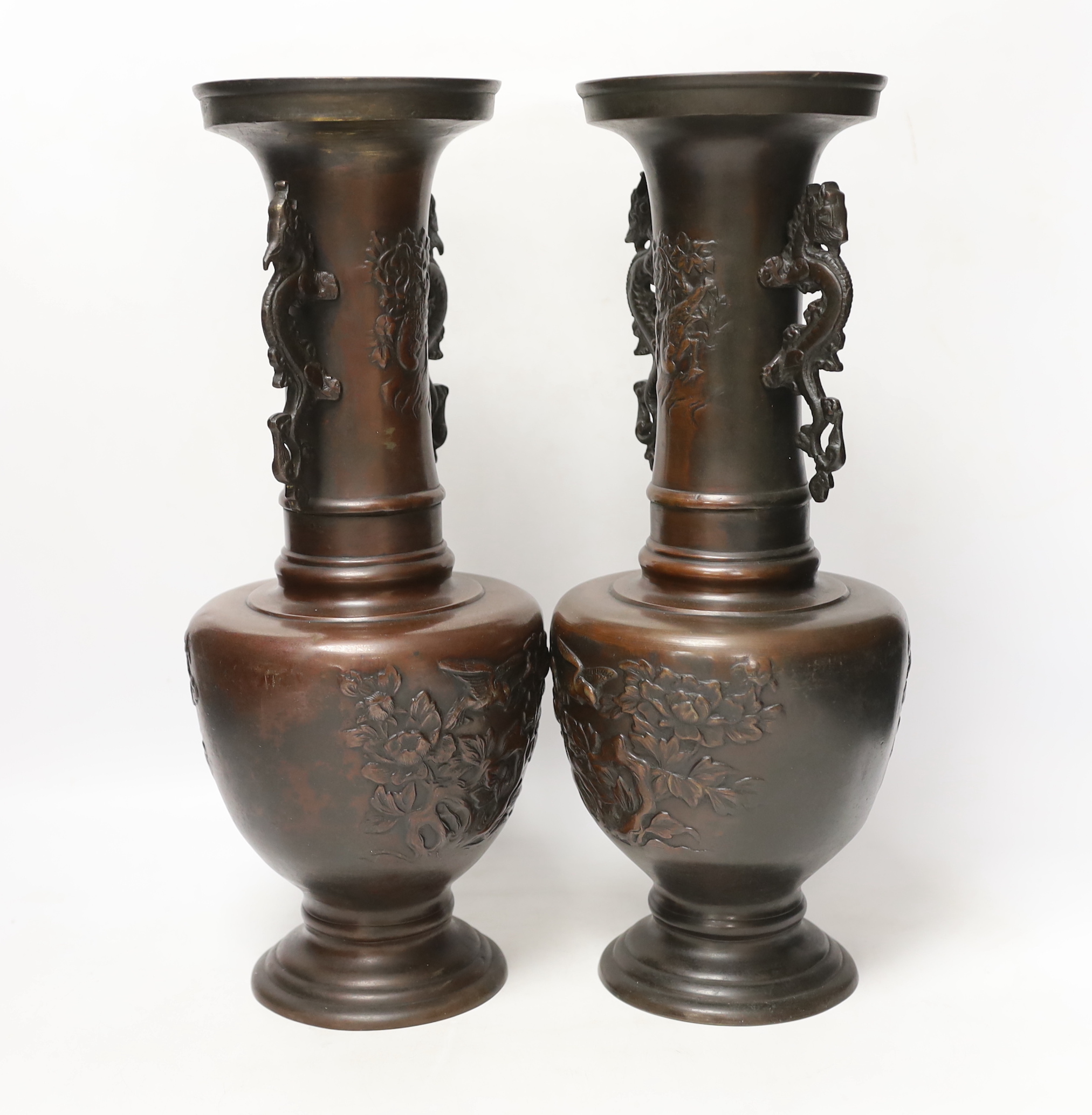 A pair of Japanese bronze vases, 38cm high